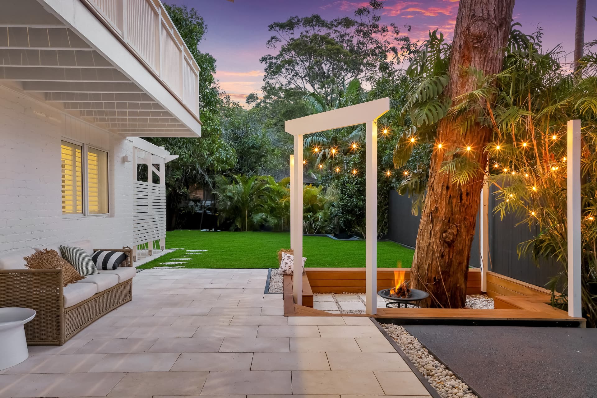 Twilight courtyard and firepit photographed by Estate Media Co